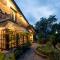 Mystic Abode, An old colonial house with a garden by Roamhome