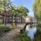 Bijzonder stadshuis met diepe moderne tuin. - 莱茵河畔阿尔芬