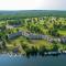 Lakefront Birchwood Condo with Pool and Hot Tub!