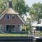 Child-friendly villa, in a holiday park on the water in Friesland - Idskenhuizen