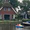 Child-friendly villa, in a holiday park on the water in Friesland - Idskenhuizen