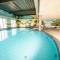 Nice chalet in a holiday park with swimming pool, on the Leukermeer - Well