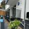 FeWo by HD mit Parkplatz, Wallbox, Wintergarten