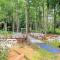 BC Log cabin with private beach river fire pit AC wifi onsite trails ski slope views