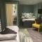 Mini Love Island style guest house includes personal warm 24 hour swimming pool, outdoor bathtub, BBQ and fire pit, all this is secretly located in the busy suburbs of Nottingham