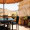 A Holiday Home Duplex in a Gozo Village Square
