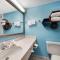 HomeTowne Studios by Red Roof Painted Post