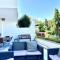 Blue House in Guadalmina Baja, with a large terrace overlooking the Golf