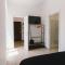 Ballaro’ House - rooms with shared kitchen