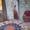 La loma del chivo Llc Stone Cottage alternative building