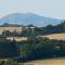 Cosy bungalow with views, walks, garden & parking.