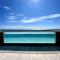 Modern Loft with Rooftop Pool Steps from the Beach by Solmar Rentals - Playa del Carmen