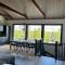 Porthos Ski-in Lodge with private hot tub and sauna in Lapland