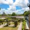 Corn Barn at East Trenean Farm -Luxury Cornish Barn Conversion sleeping 8 with hot tub, private garden, rural views and EV facilities