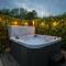 East Trenean Farm Cottages -4 Luxury Cornish Cottages sleeping 20 with hot tubs, private gardens, rural views and EV facilities