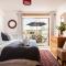East Trenean Farm Cottages -4 Luxury Cornish Cottages sleeping 20 with hot tubs, private gardens, rural views and EV facilities