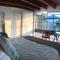 Suite privada con jacuzzi y vista al lago