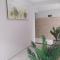 Pousada Quarto com frigobar,ar e garagem gratuita