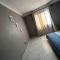 Izana Home 1 Bedroom Condo (w/TV, Wi-Fi, Workspace) - Kampala
