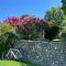 Holiday home Punta DOro with garden, parking place and lake access at 300 m