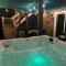 WOW!! Ultimate Pocono Retreat, Hot Tub, Game Room, Deck, Lakes, Skiing, Pools