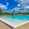 Walk to Beaches Tree-Lined Pocono Lake Retreat!