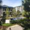 PineSuites Relaxing 2-bedroom condo with pool and garden view accepts small pets only