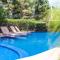 PineSuites Relaxing 2-bedroom condo with pool and garden view accepts small pets only