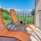 Teuta Apartments - a beach and a sea view
