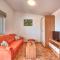 Teuta Apartments - a beach and a sea view