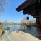 Woodpecker Log Cabin with hot tub, pizza oven bbq entertainment area, lakeside with private fishing peg situated at Tattershall Lakes - Tattershall