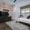 Loft condo by Mercedes Benz w balcony Apt 101