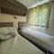 Lovely 8 Berth Caravan With Decking And Nearby Scratby Beach Ref 50005A