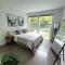 One bedroom luxury apartment (Gym, Wifi, Parking, Rooftop Deck)