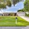 Pool and Screened-In Patio Tropical Florida Abode