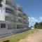 Flat de frente ao mar