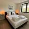 Design Apartment with 60m² terrace - heated inside pool and wellness facilities - very close to the beach