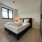 Design Apartment with 60m² terrace - heated inside pool and wellness facilities - very close to the beach