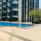 One Palm Tree Villas Condominium - Studio 5M with Balcony - Across Terminal 3 Airport