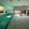 Design Apartment with 60m² terrace - heated inside pool and wellness facilities - very close to the beach - Cadzand