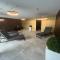 Design Apartment with 60m² terrace - heated inside pool and wellness facilities - very close to the beach