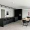 Design Apartment with 60m² terrace - heated inside pool and wellness facilities - very close to the beach