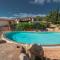 ISA-Residence with swimming-pool in Tanaunella, apartments with air conditioning and private outdoor space