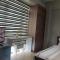 Henry's Newport Condotel - Manila
