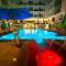 Sanctuary Sunlit Hurghada Haven with 4 Pools, Rooftop Sunsets & Gourmet Bites Steps Away - 赫尔格达