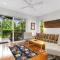 Modern meets Tropical in this Free-standing Home