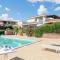 ISA-Residence with swimming-pool in Cala Girgolu, apartments with private outdoor area