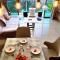 Palazio 3 bedroom balcony lake view high floor by GDRAGON HomeStay