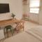 Motyl Apartamenty Studio lub pokój z łazienką