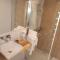 Motyl Apartamenty Studio lub pokój z łazienką